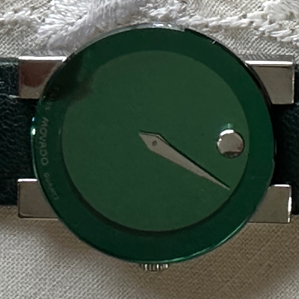 Movado ladies Green and Silver watch